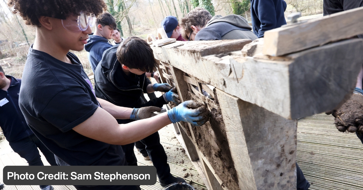 Brighton Met working on wattle and daub