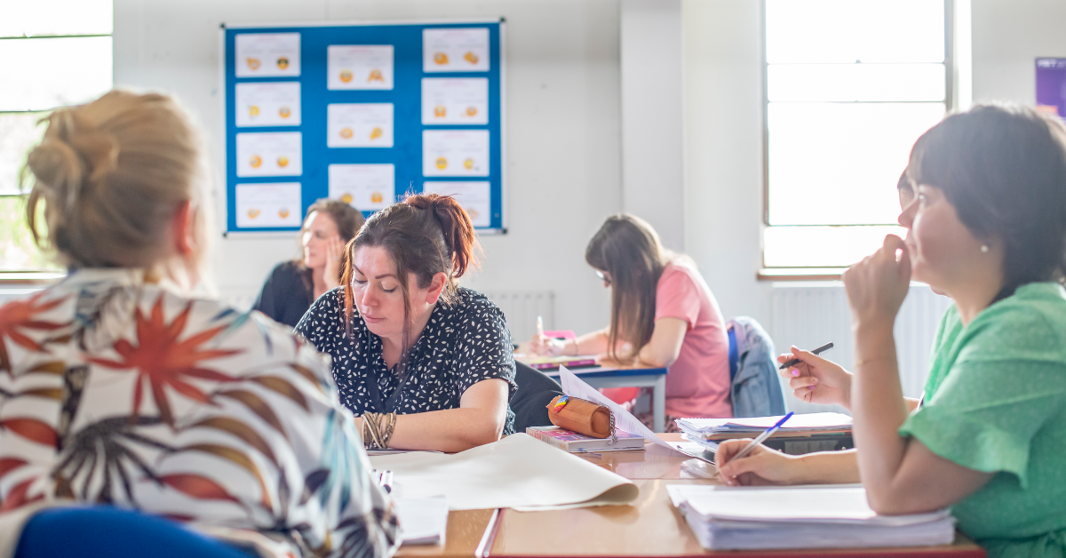 Some of our adult learners learning in class